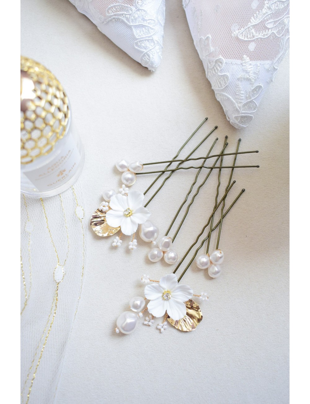 Pics à perles et fleurs dorées ou argentées pour le chignon de mariée