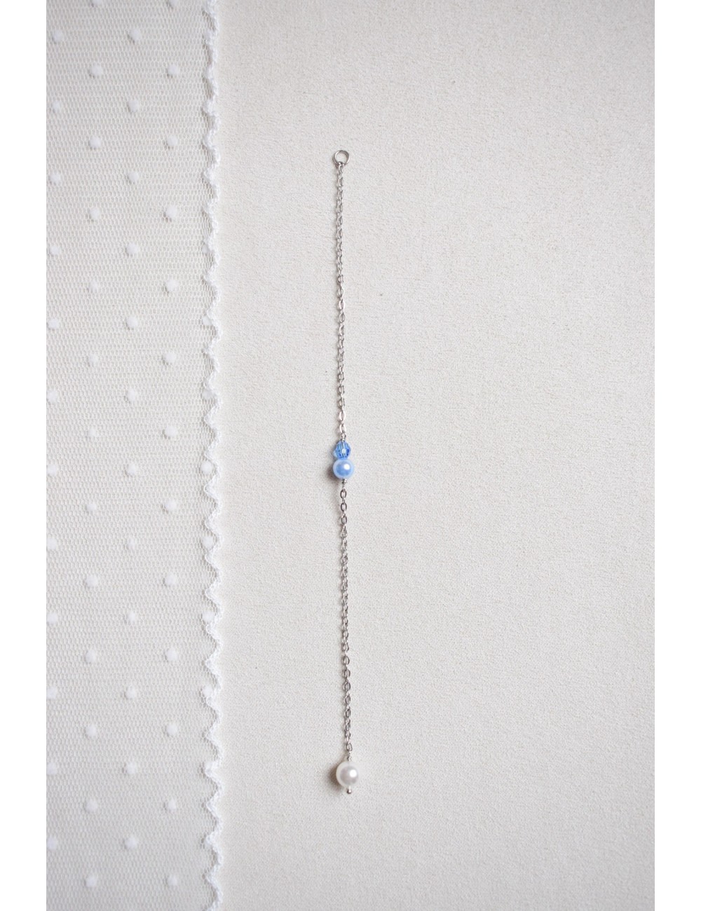 Pendant de dos ''Quelque chose de bleu'' pour la tradition du mariage