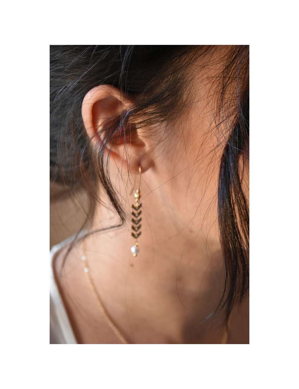 Boucles d'oreilles Oly pendantes en chaine épi dorée.