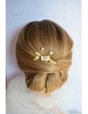 Peigne Diane pour le chignon de la mariée, composé de feuilles dorées et de strass Swarovski.