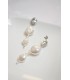 Boucles d'oreilles pour mariée glamour chic avec cascade de perles nacrées et cristal en forme de poire.