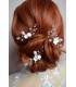 piques à cheveux mariage avec des fleurs blanches en porcelaine et des perles en cristal
