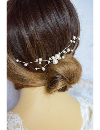 Pic à cheveux avec des perles nacrées pour un style glamour.