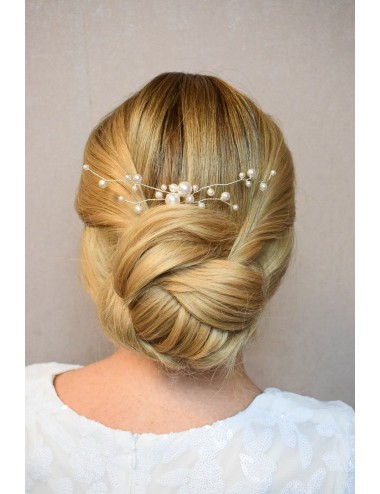 Pic à cheveux avec des perles nacrées pour un style glamour.
