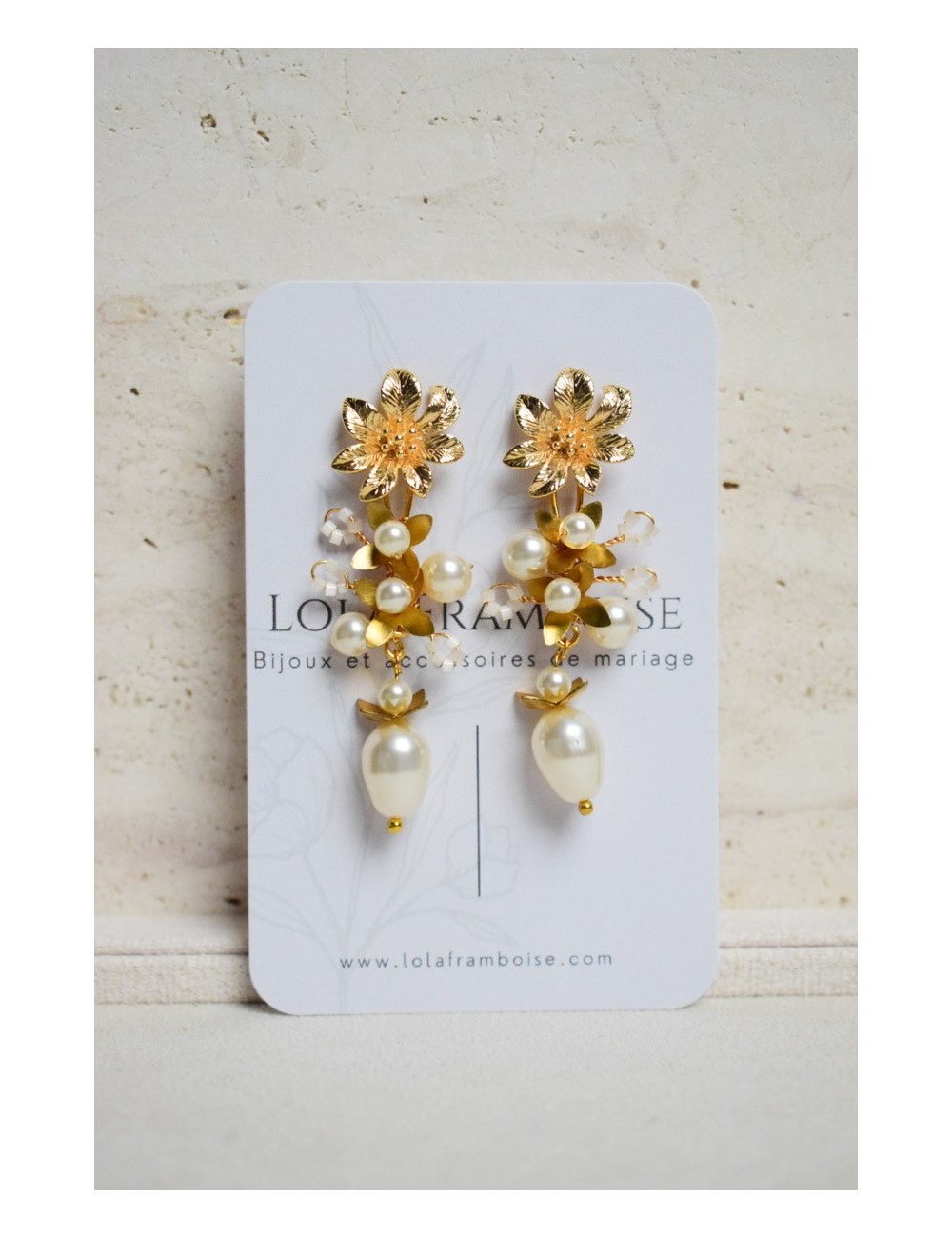 Boucles d'oreilles pour la mariée avec une chaine strassée longue