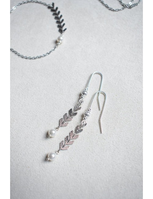 Boucles d'oreilles Oly pendantes en chaine épi dorée.