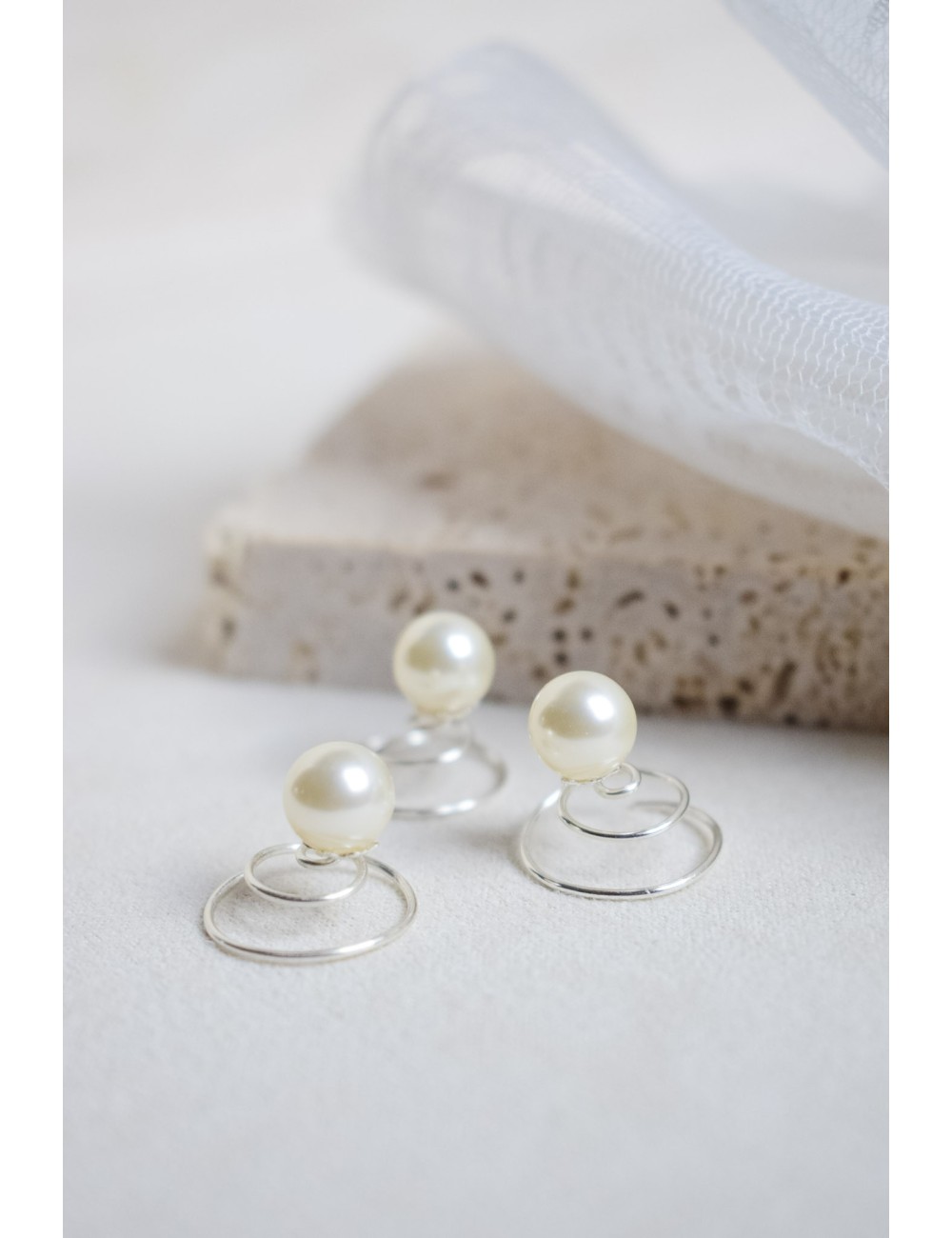 Ressorts de cheveux pour la mariée avec des perles nacrées